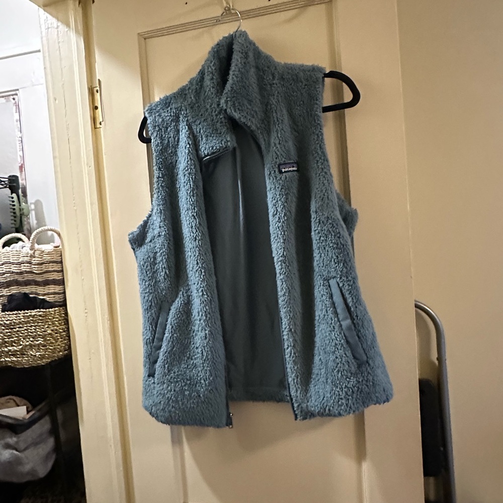 Teal fuzzy vest